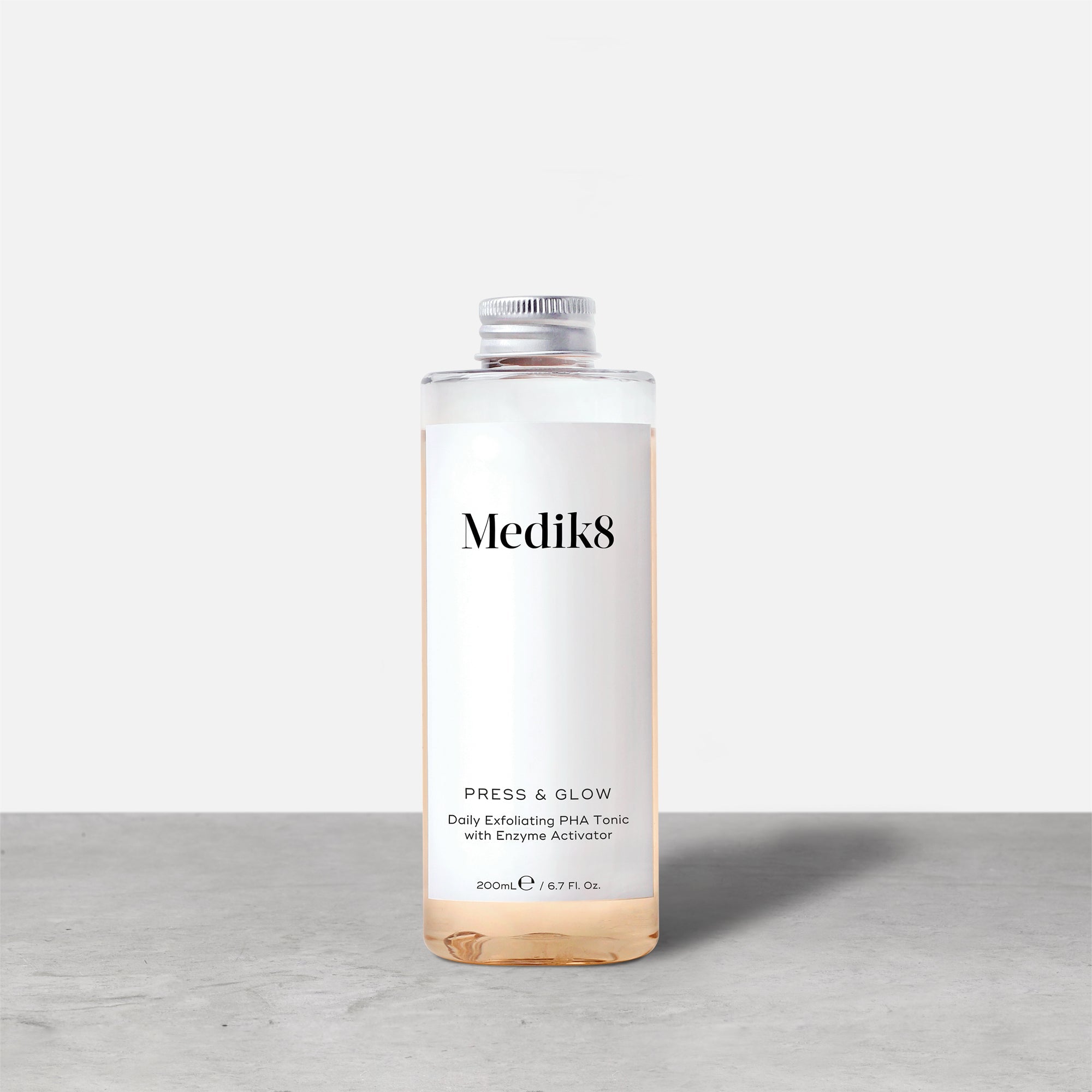 Press & Glow™ by Medik8. A Daily Exfoliating PHA Tonic with Enzyme Activator